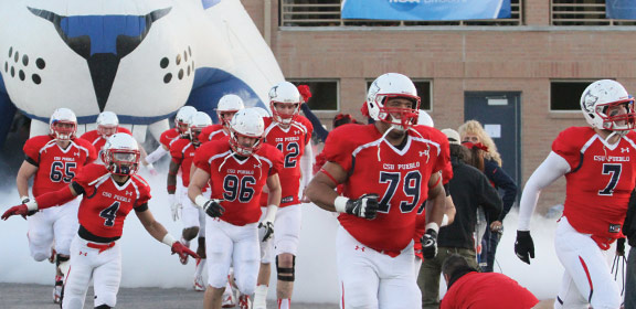 Colorado State University-Pueblo football players coming out of the locker room