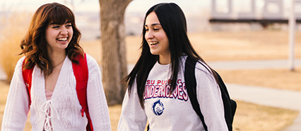 two students smiling