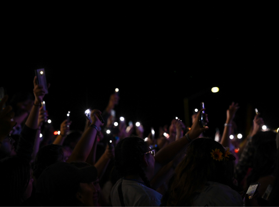 students using phone during Concerk