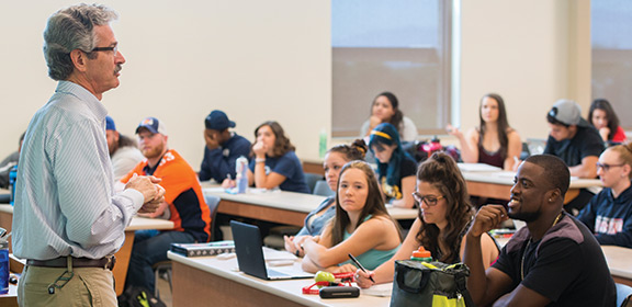 A professor lecturing in the General Classroom Building