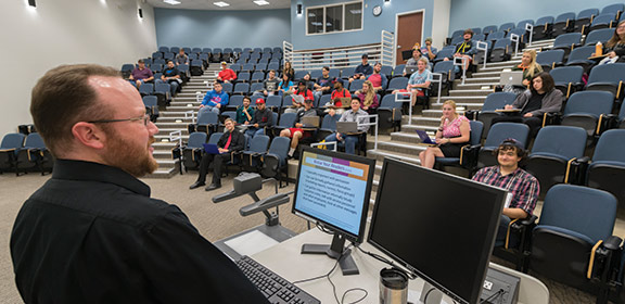 Students attending a lecture in the Hasan School of Business