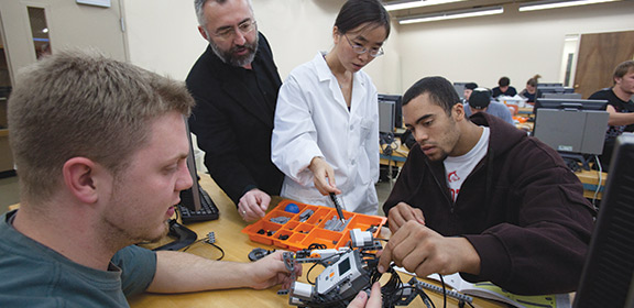 Engineering students working in a lab