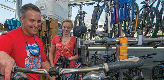 Colorado State University-Pueblo Outdoor Pursuits staff preparing bikes to rent