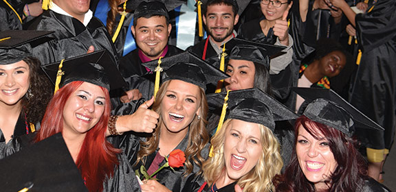 Colorado State University-Pueblo students celebrating graduation