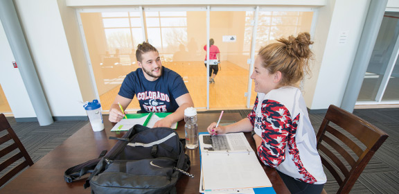 Students engaging in conversation within the Student Recreation Center
