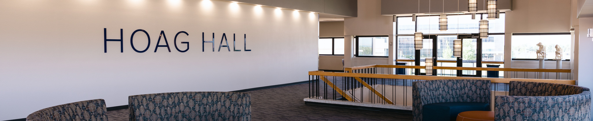 The Art and Music building displaying banners of CHASS