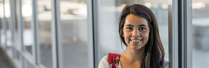 Student smiling at camera