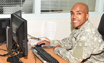 A CSU-Pueblo Student working as a workstudy