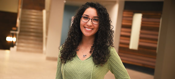a student wearing a green shirt