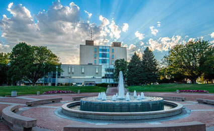 a photo of the fountain and larc by pres mottet