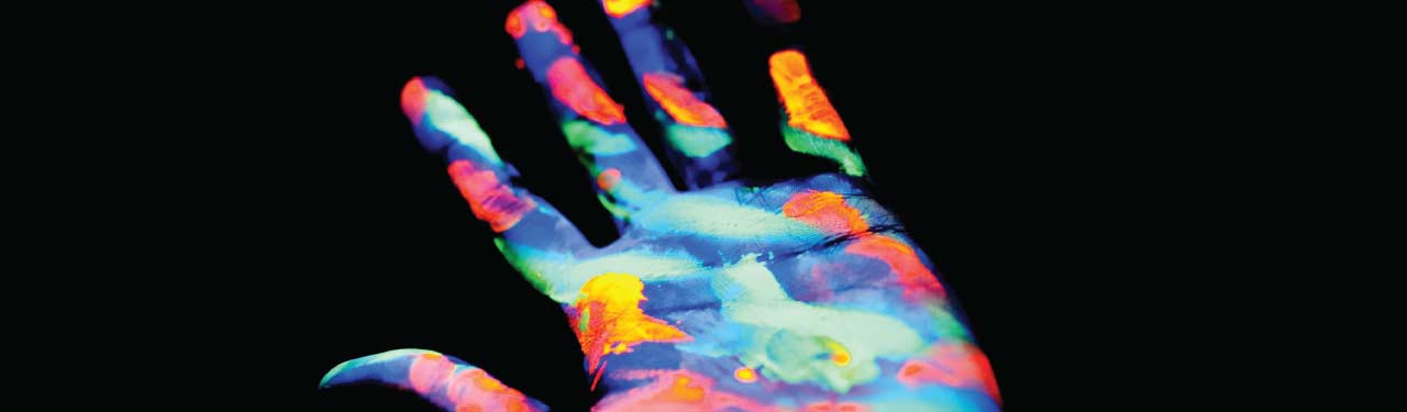 Hand with glow in the dark paint
