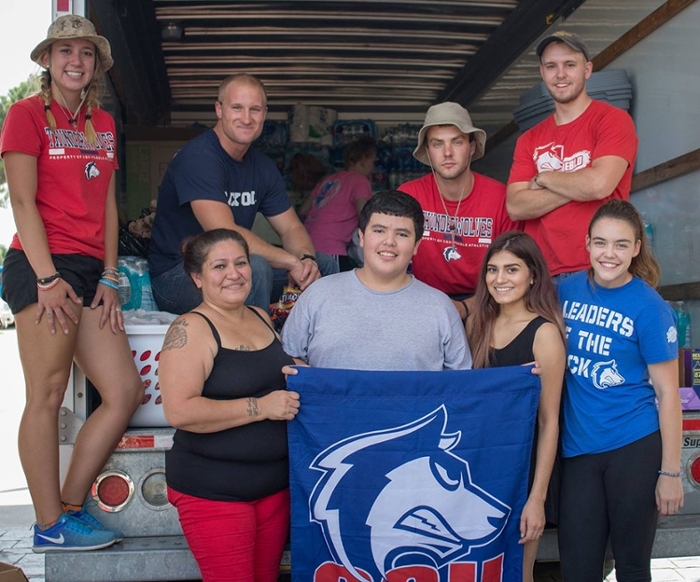Students assisting with hurricane relief efforts in Houston, TX.