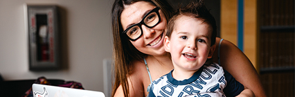 mother and son smiling