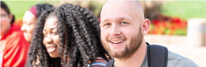 Student smiling at camera