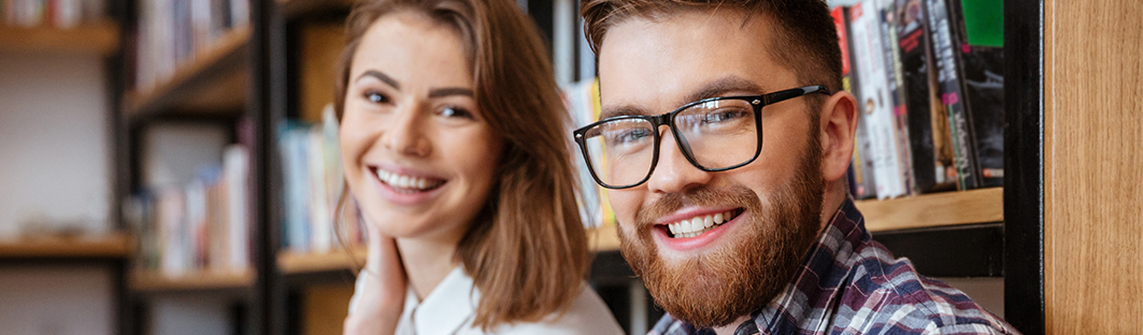 two students sitting at the library