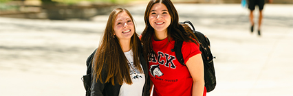 two students smiling