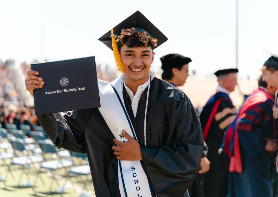 CSU Pueblo commencement graduates celebrating