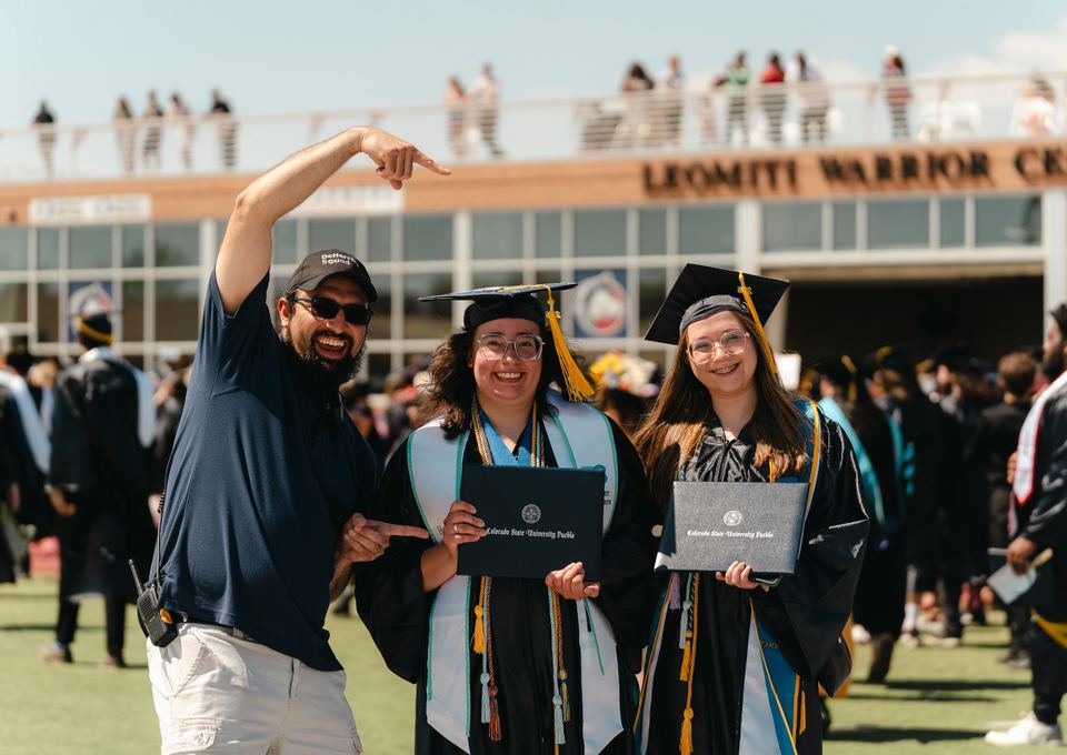 CSU Pueblo graduates celebrating at commencement