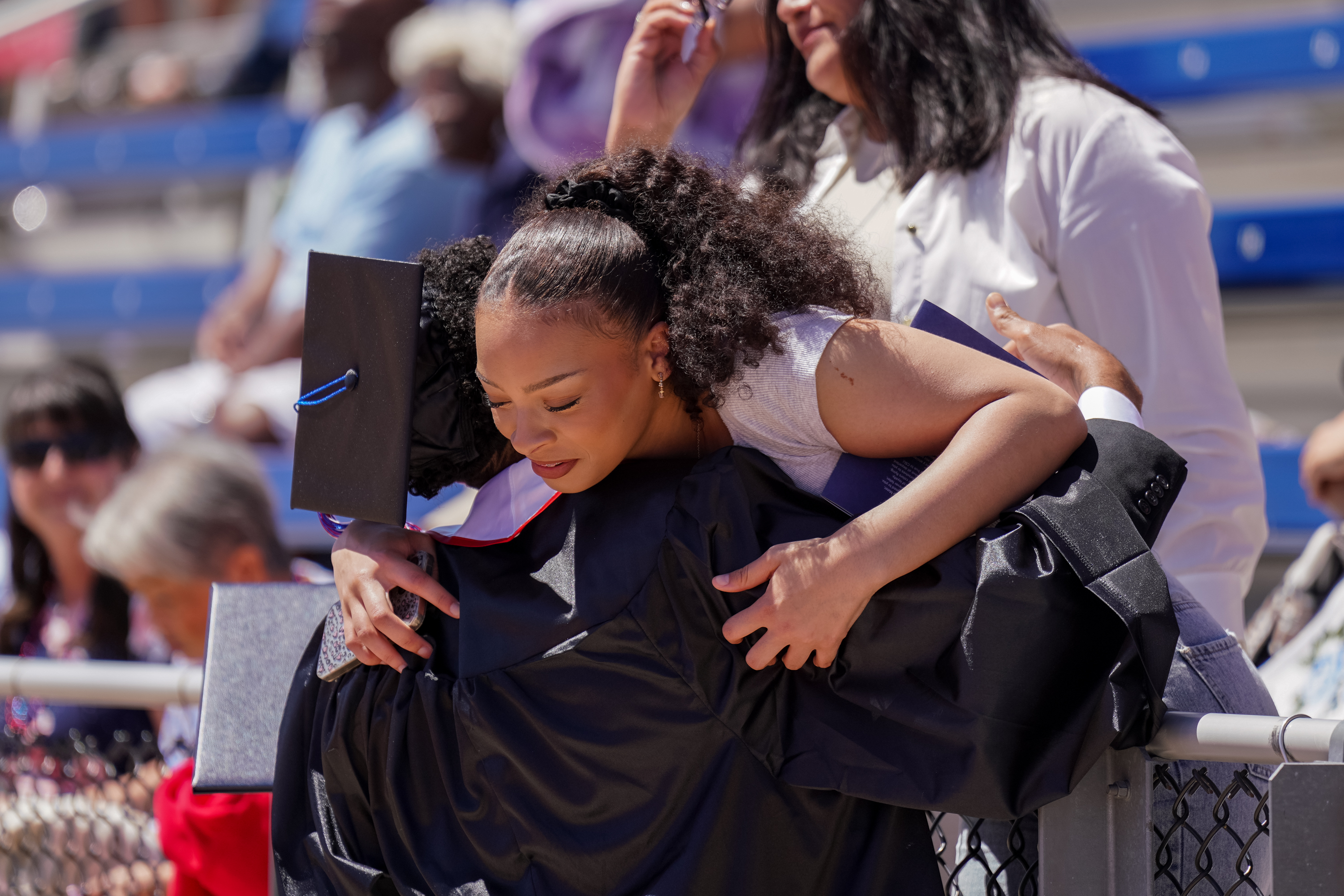Guests cheering at ThunderBowl Stadium during CSU Pueblo commencement