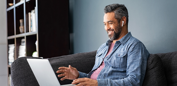 happy man on computer