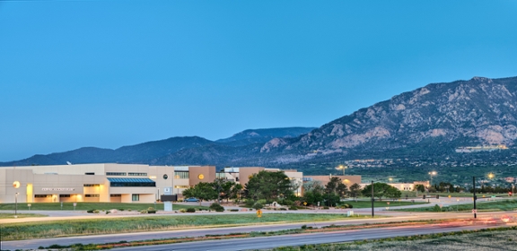 Pikes Peak State College mountain range with college in front of it.