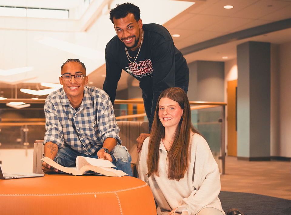 Three CSU Pueblo students smiling together