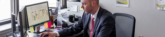 Staff member working at desk