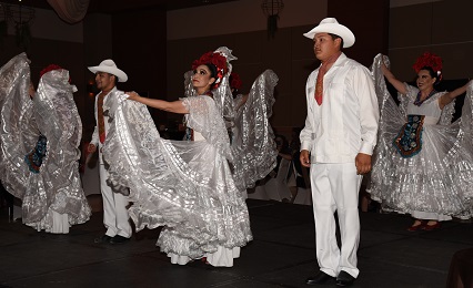 Man and Woman dancing in Hispanic garments