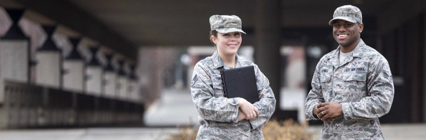 airman at a range smiling