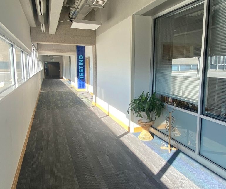 The Testing Center is featured down a long hallway in the Library and Academic Resource Center