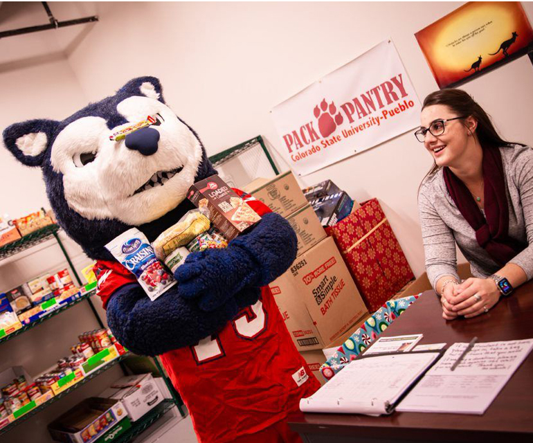 Wolfie at the Pack Pantry with Jordan