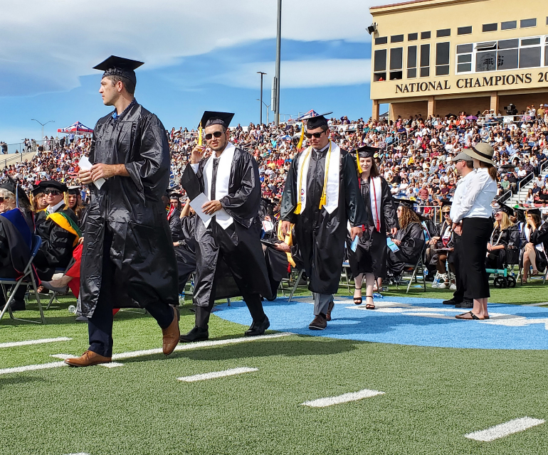 Commencement 2022 graduates and crowd