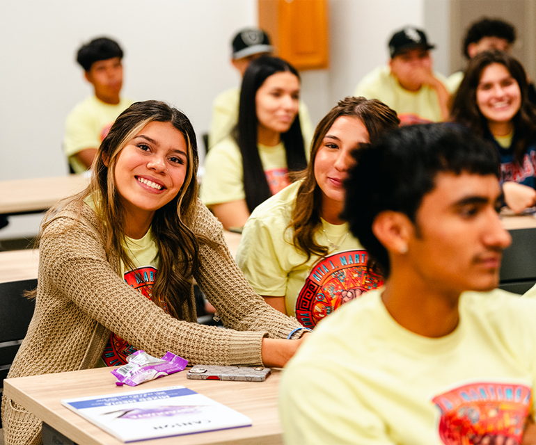 youth smiling at camera