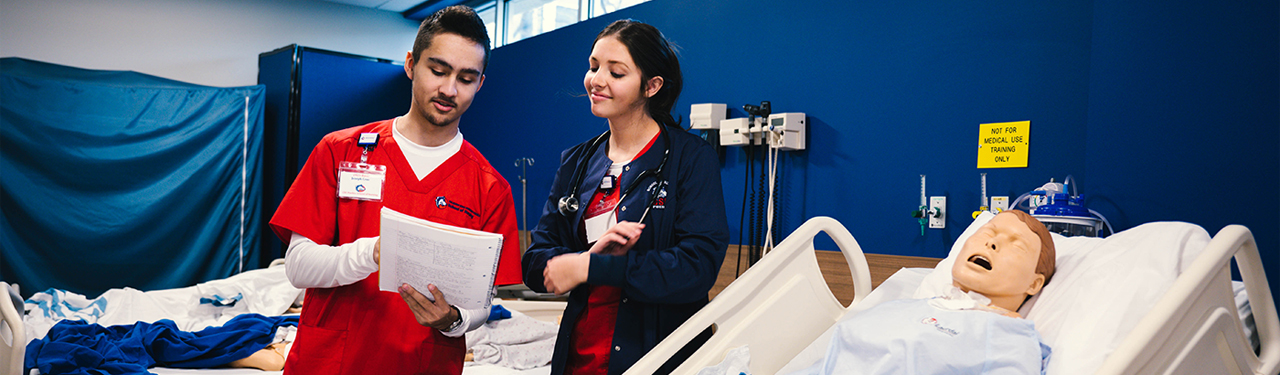 Nursing lab with two students