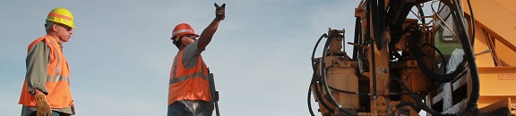 Two men working in construction
