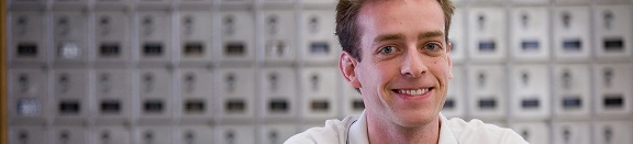 Student smiling at the camera
