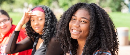 CSU-Pueblo student smiling at the camera