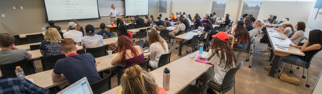 students in classroom listening to lecture