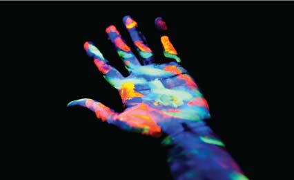 hand with glow in the dark paint