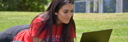 student working on computer