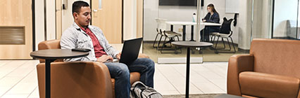 student viewing laptop