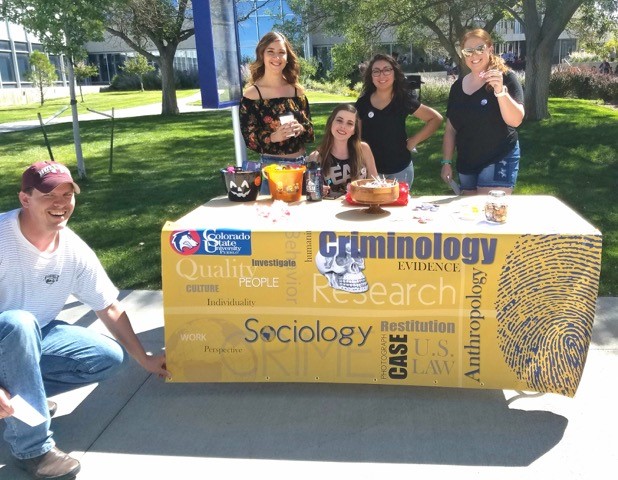 Sociology/Criminology club next to their Halloween booth
