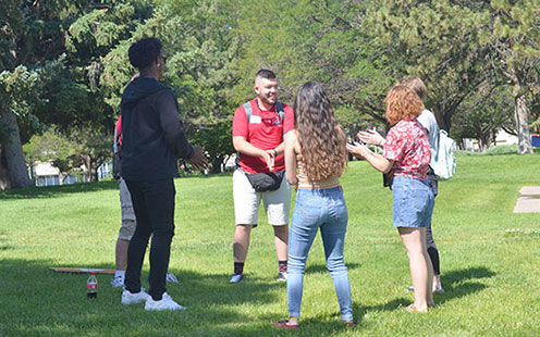 Students engaging with Orientation Leader.
