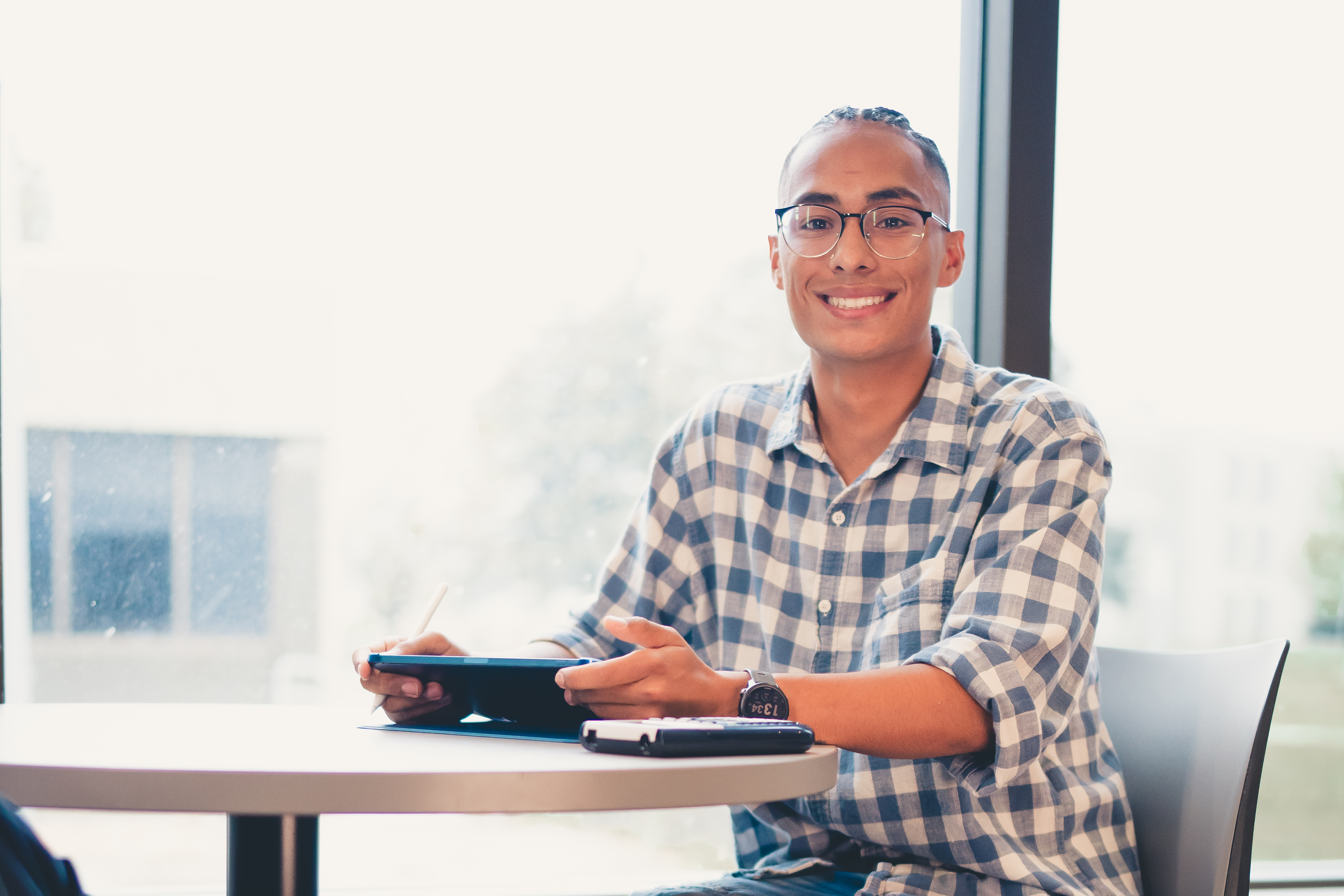 CSU Pueblo students collaborating and working on campus