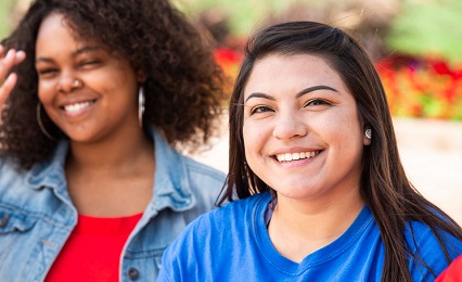 Student smiling at the camera