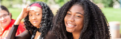 Students smiling at camera